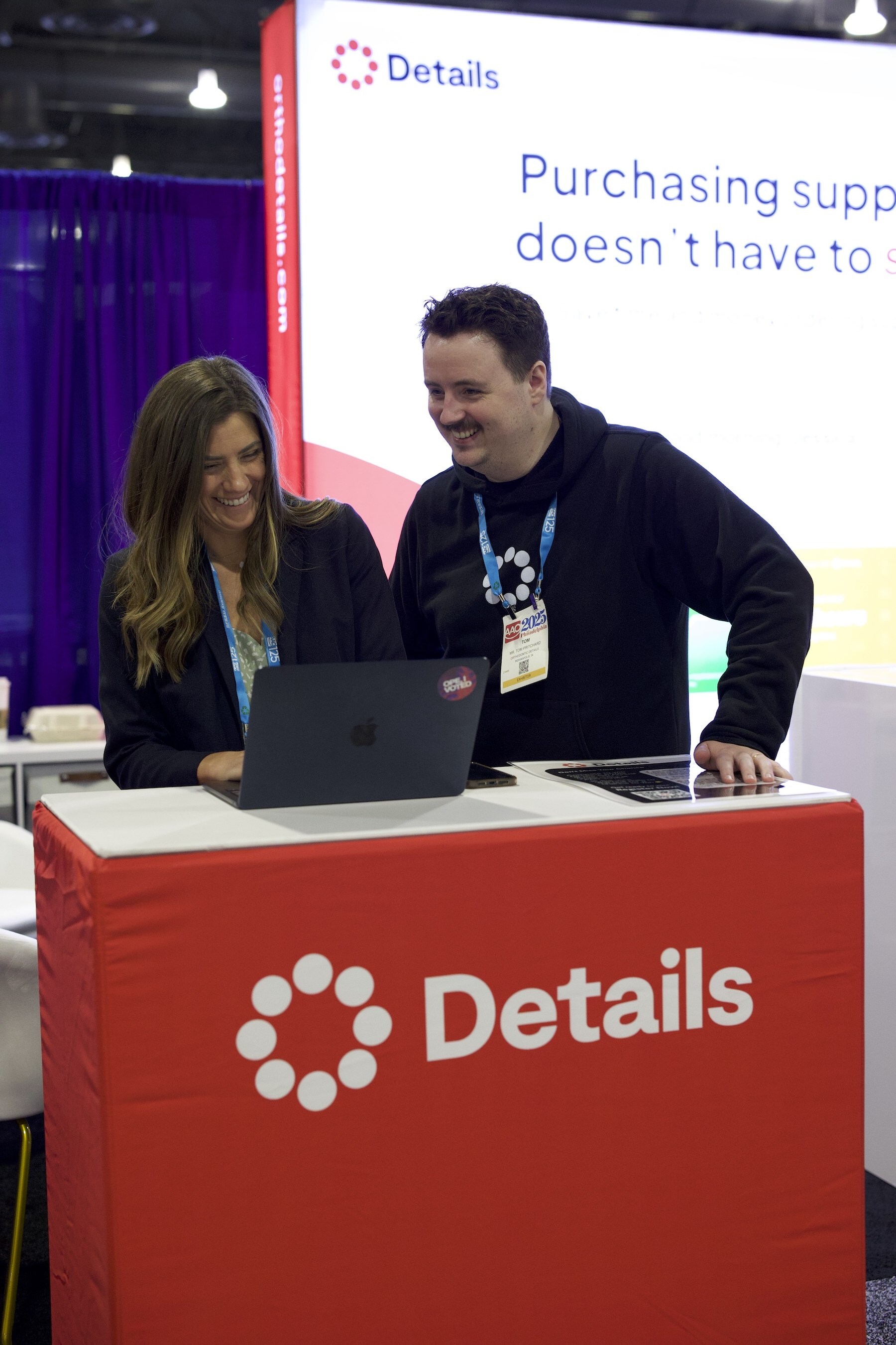 Details CTO Tom Pritchard reviews the new inventory management tool with the company’s VP of Strategic Partnerships, Paige Dore, at the American Association of Orthodontists’ recent conference.