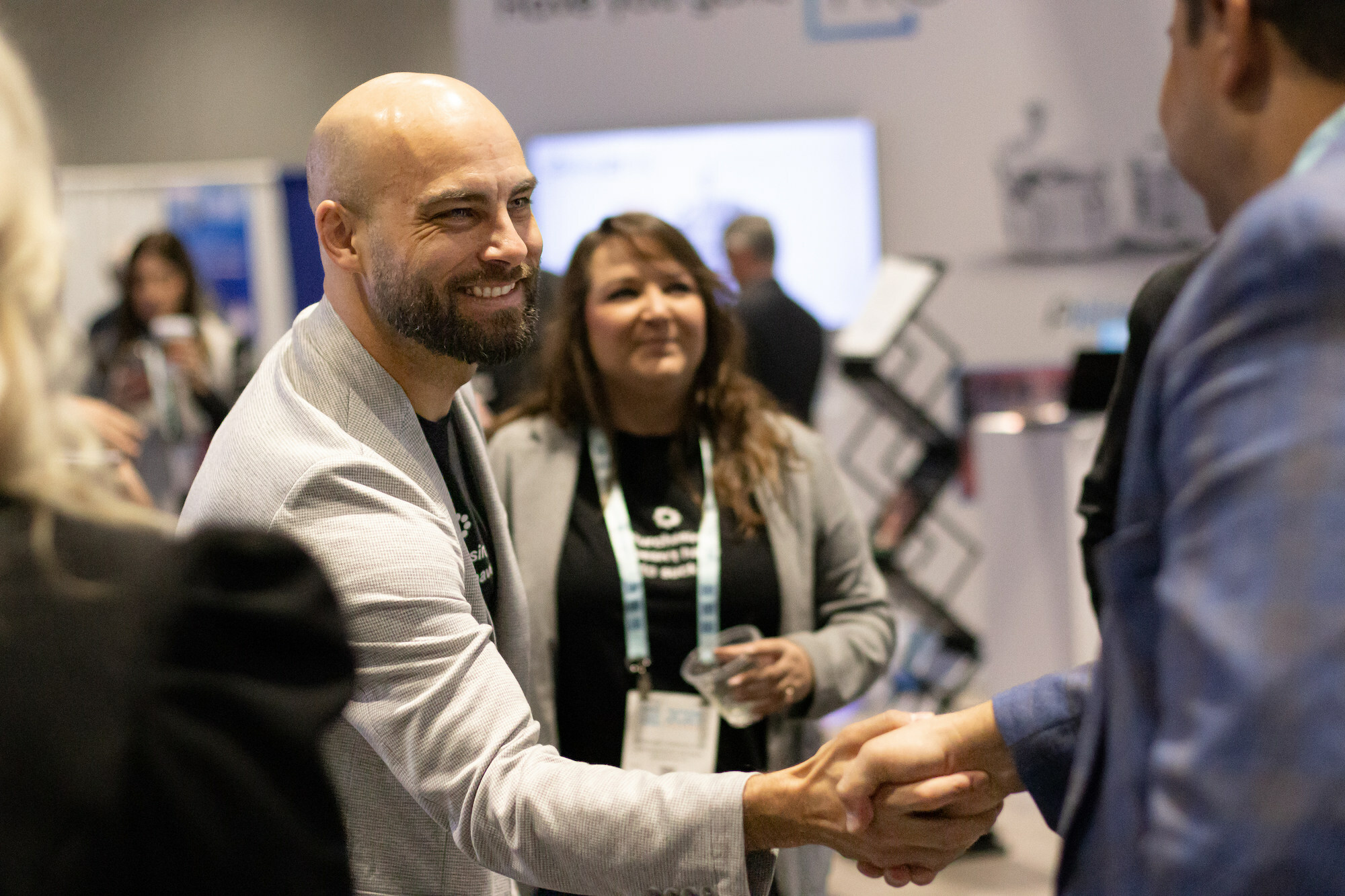 Details President Nick Wangler greets a supplier partner.